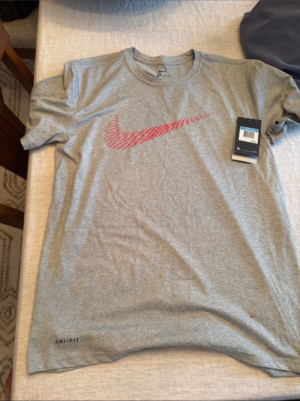 Nike Gray Short Sleeve Tee with Red Swoosh